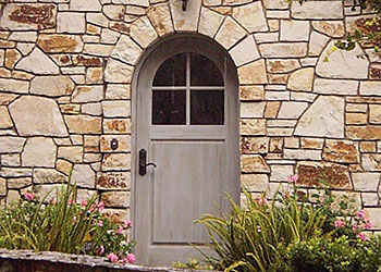 carmel stone rock wall and doorway arch